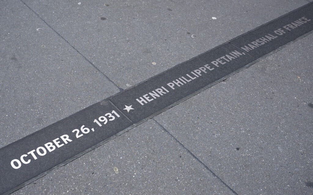 Photo of sidewalk plaque commemorating Henri Phillippe Petain